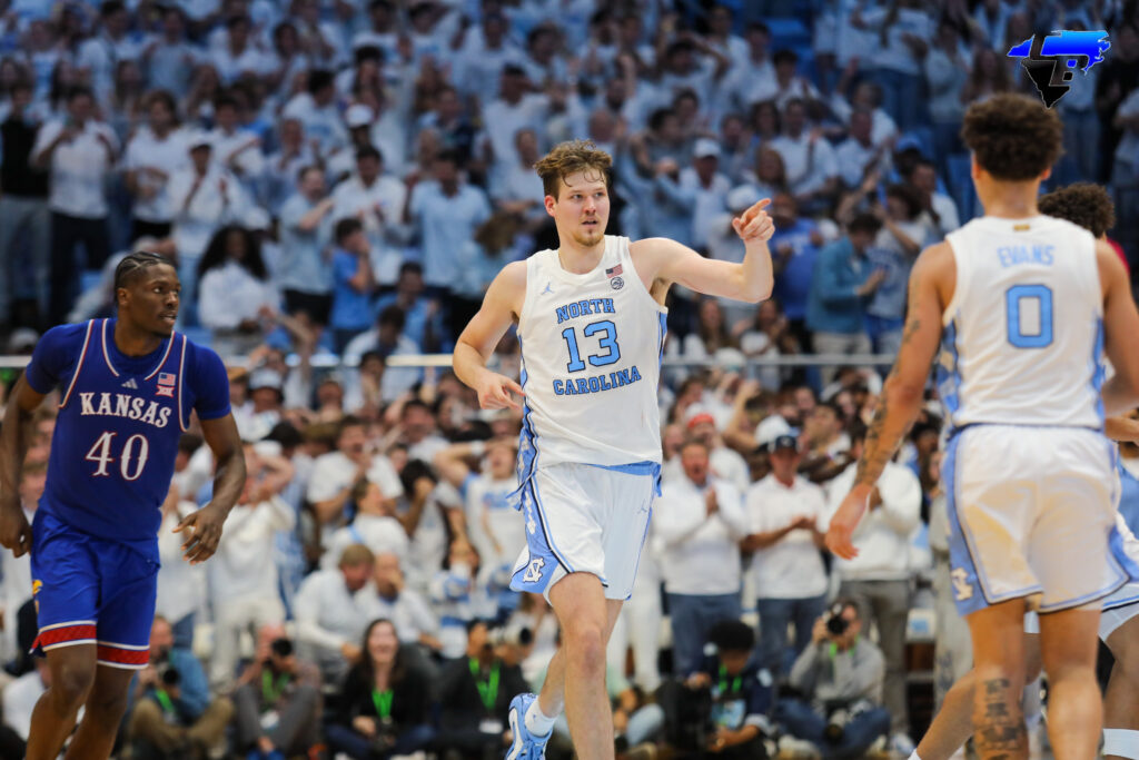 #13 Henri Veesaar points to the passer after scoring