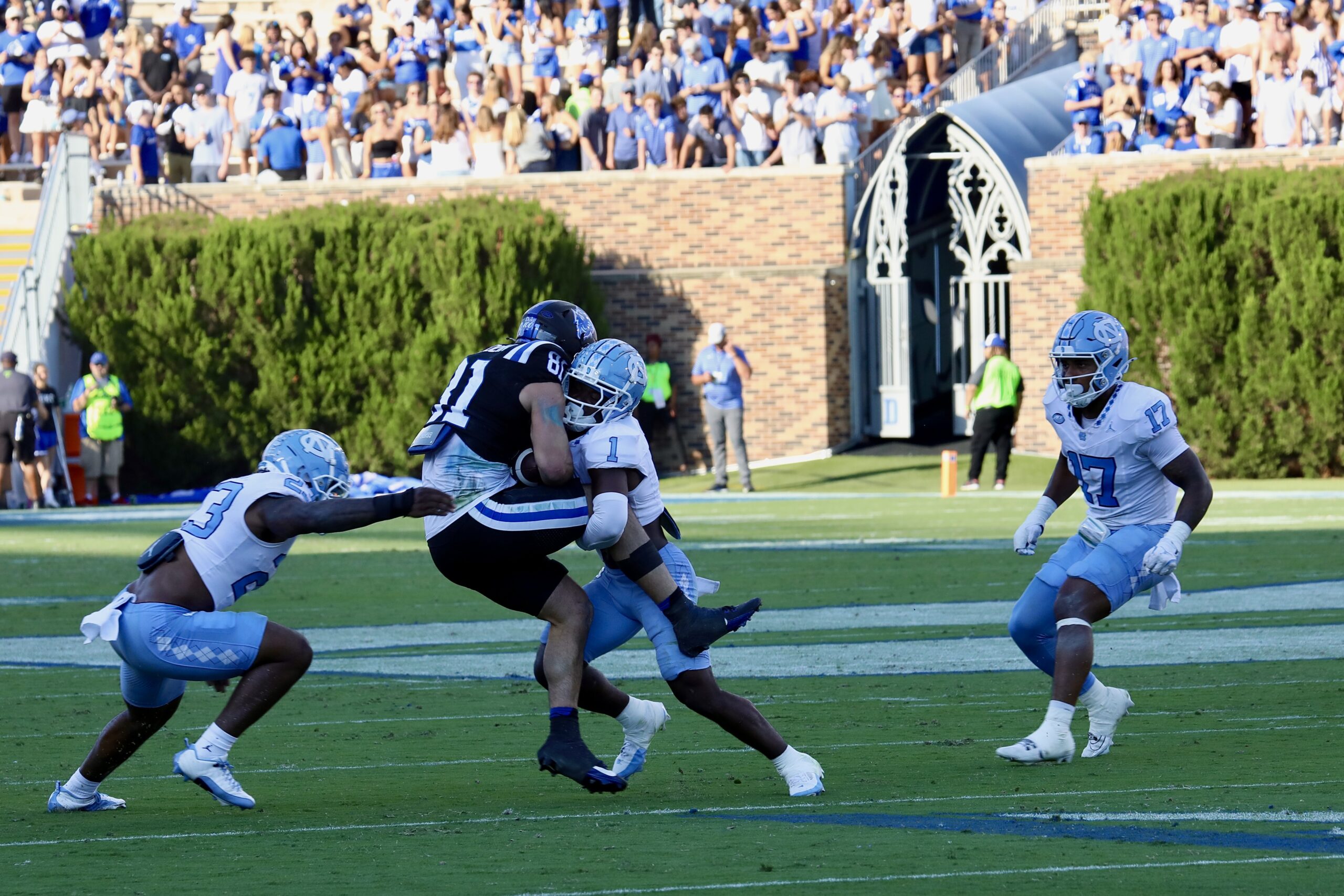 Players tackling - Duke vs UNC