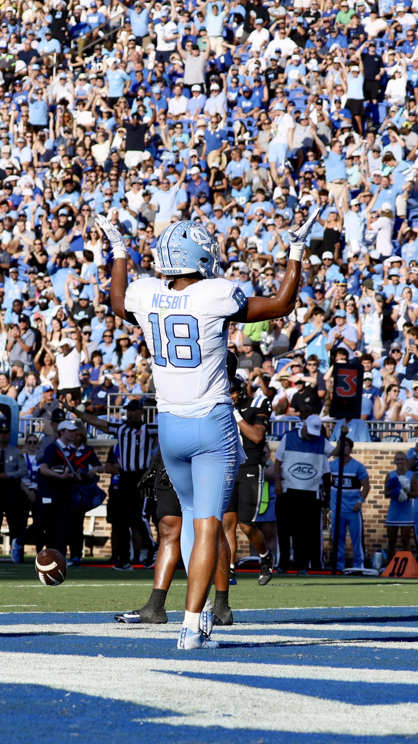 #18 Nesbit celebrating with his hands up - Duke vs UNC