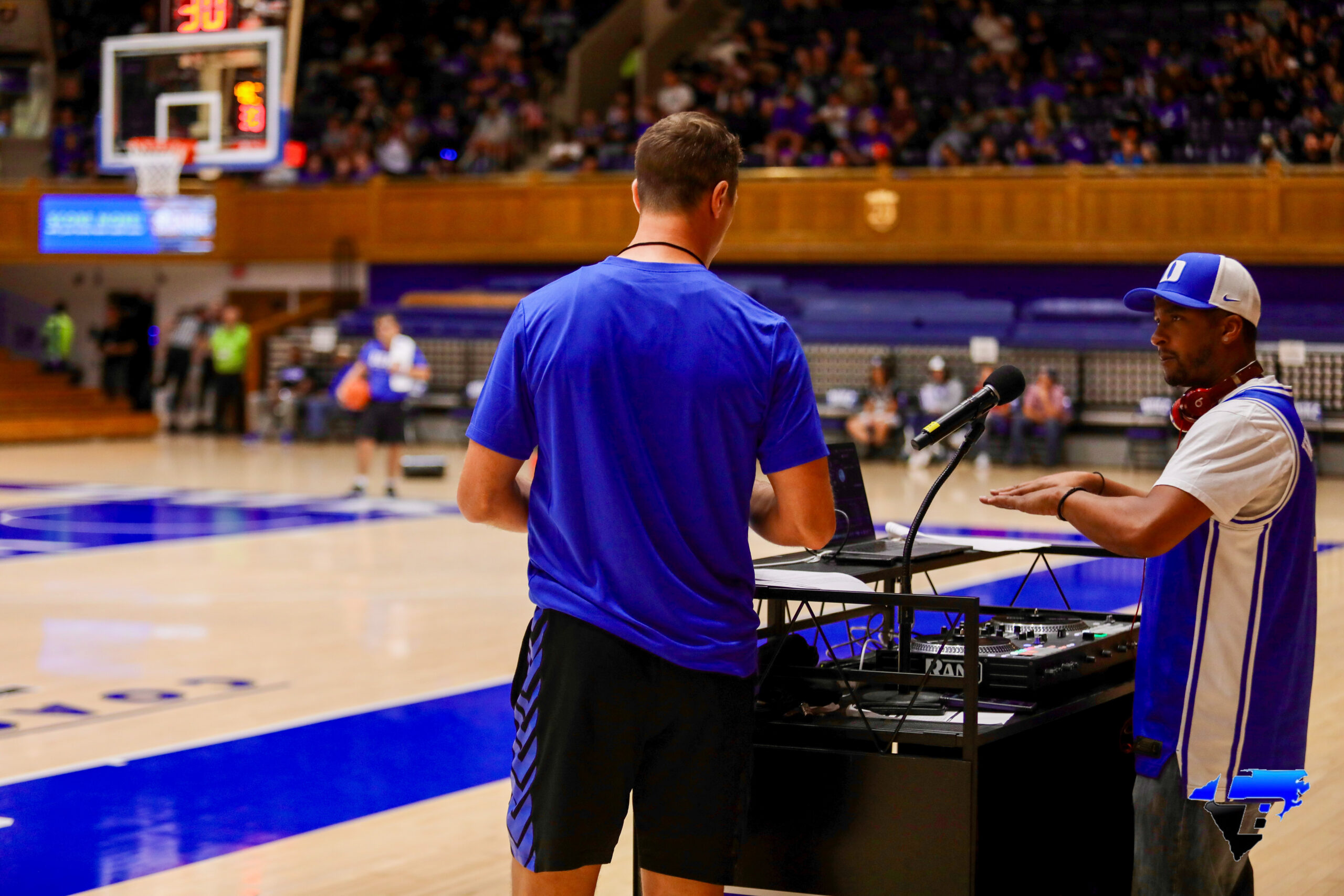 Jon Scheyer speaking with the DJ